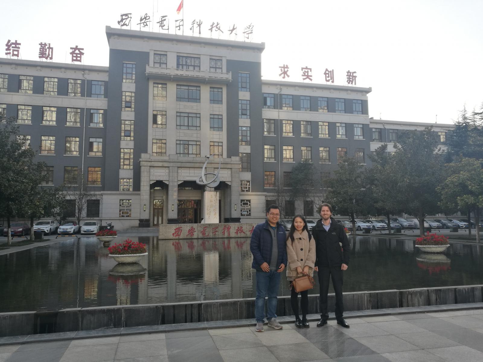 Prof. Yong Xie with Delmic engineers